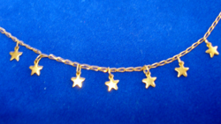 18K gold necklace decorated with stars