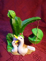 Porcelain candle holder and also a mini vase. Candle hanging on a cactus branch with two ducks. He has!