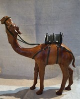 Handmade camel sculpture covered in leather.