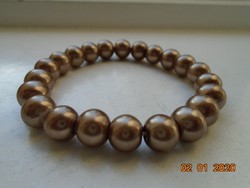 Bracelet made of Swarovski gold-colored beads