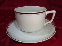 Mz Czechoslovak porcelain teacup + placemat with gold trim. He has!