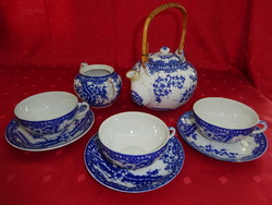 Japanese porcelain tea set for three people with a blue pattern. He has!
