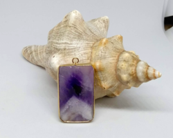 Faceted amethyst mineral pendant
