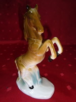 Regal porcelain, horse perched on two legs, height 15.5 cm. He has!
