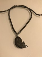 Hematite necklace with carved fish pendant,