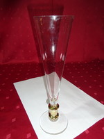 Funnel-shaped champagne glass with gold decoration. Its height is 23.5 cm. He has!