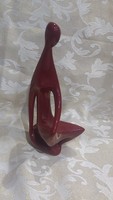 Zsolnay piros eozin kövön ülő art deco figura