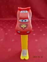 Pez sugar dispenser with red car on top. He has!