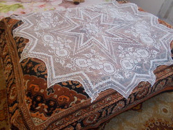Round lace tablecloth made with very nice crochet