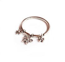Three small flower silver rings