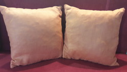 2 orange decorative pillows