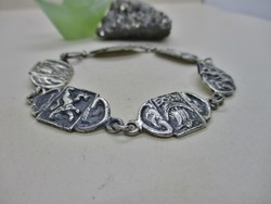 Beautiful antique scene with silver bracelet