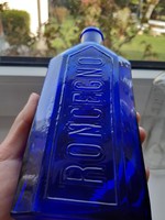 Kék gyógyszeres üveg