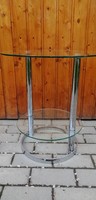 Chrome-footed stone-shaped glass table. Negotiable!