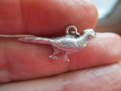 Cute little solid, solid silver dino pendant