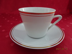 Lowland porcelain, teacup with gold border + placemat. He has!