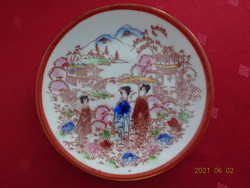 Japanese porcelain teacup coaster, diameter 13.5 cm. He has!