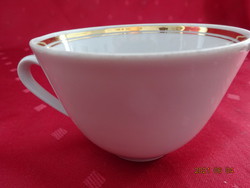 Colditz quality German porcelain teacup with gold trim. He has!
