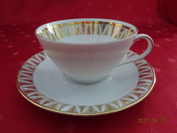 Bavaria German porcelain, gold-edged teacup + placemat. He has!