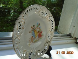 An angelic, art nouveau openwork decorative bowl with a relief pattern, an allegory of fine art