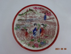 Japanese porcelain coffee cup coaster, diameter 11.5 cm. He has!