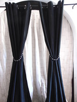 Pair of black polyester curtains