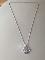 Bizsu necklace with a happy and sad rotating pendant
