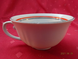 German porcelain teacup with red stripe inside. He has!