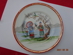 Japanese porcelain small plate with a picture depicting a scene, diameter 17.5 cm. He has!