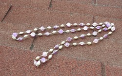 Necklace made of pink cylinders