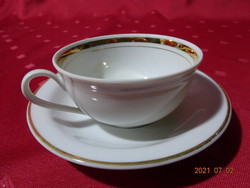 Kahla German porcelain coffee cup with other placemat. He has!