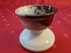 Glazed ceramic candle holder, height 6 cm. He has!