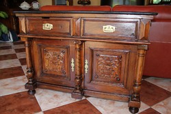 Old German richly carved marble chest of drawers