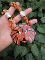 Lion necklace with coral stones and shells