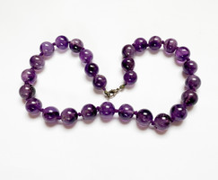 Old amethyst necklace, made of 14-15mm beads.