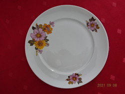 Lowland porcelain cake plate with yellow and pink flowers. He has!