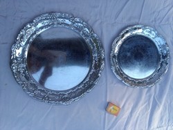 Two pieces of metal tray together