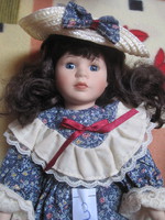 Charming, marked porcelain doll from the pomenade collection. 3.