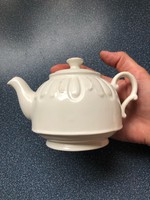 Small romantic white teapot