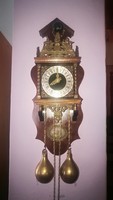Two-weight ornate, copper-framed wall clock in excellent condition with a statue of Hercules. Price drop!