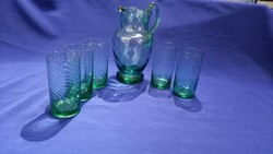 Green twisted glass pitcher with glasses