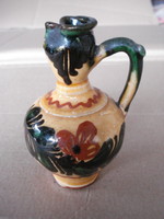Folk pottery. Pitcher with ears