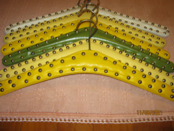 Faux leather hanger with 6 rivets