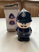 English policeman with porcelain money box