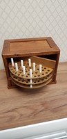 Wooden box with old revolving door cigarettes ...
