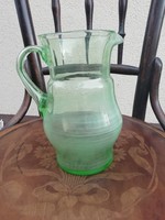 Old pale green glass pitcher