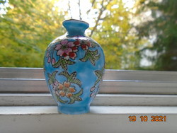 Small turquoise blue Chinese vase with hand painted colorful floral patterns