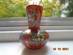 Small iron red Chinese vase with hand painted colorful floral patterns