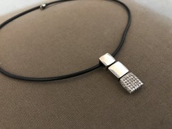 Rubber necklace with silver pendant
