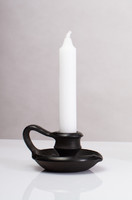 Folk black clay candle holder